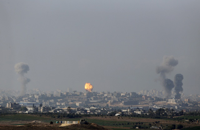 An explosion and smoke are seen after an Israeli strike in the northern Gaza Strip