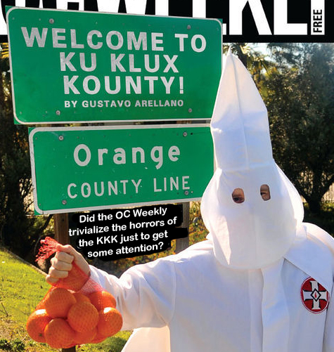 OC Weekly KKK Kover OC Weekly "Ku Klux Kounty" cover showing man in KKK garb holding oranges