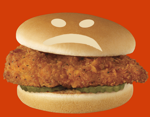 Chicken sandwich with sad face