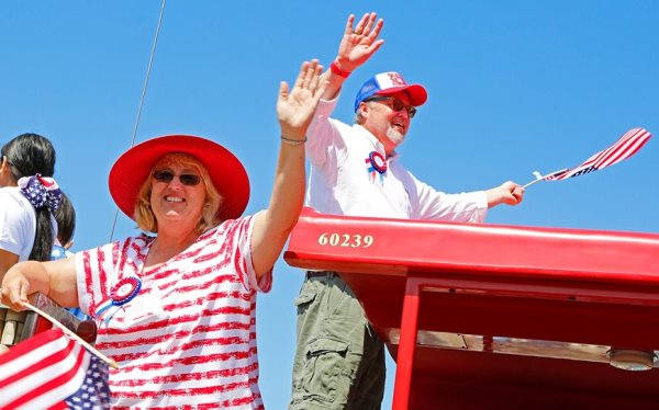 HB Parade - Connie and Joe waving the flag HB Parade - Connie and Joe waving the flag