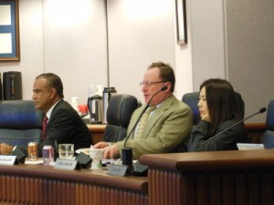 BFF.  Steve Sheldon and Dina Nguyen on right at May 14 OCWD meeting.  (Harry Sidhu on left.)  All three voted to negotiate a contract with Poseidon. Several Garden Grove residents attending the forum complained that she was non responsive. She did not attend the forum.