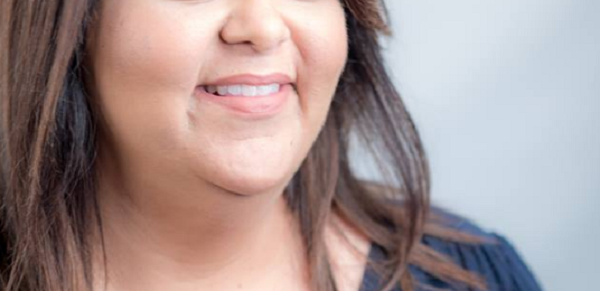 I don't want her really fantastic eye makeup to distract you from the sincerity of her smile.