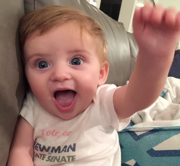 The photogenic Newman Cub courts controversy by flashing a Baby Power salute!