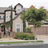 Phu Nguyen argues his longtime neo-Nazi Asian neighbors are “mistaken” when they claim he’s spent the last five years living in this gated Santa Ana chateau with his family.